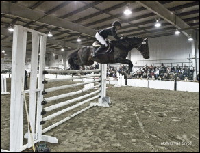 Whirlwind and Laura Iversen competing in equestrian.